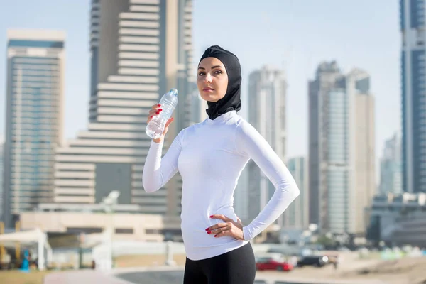 Arabian woman training outdoors