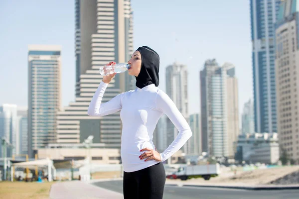 Arabian woman training outdoors