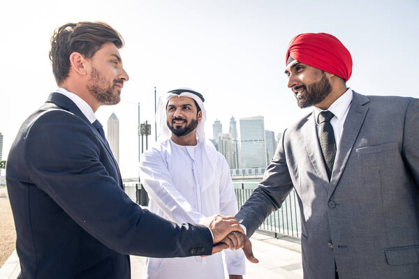 Multi-ethnic business team meeting