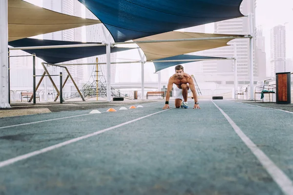 Beautiful man doing work out and different exercises outdoor