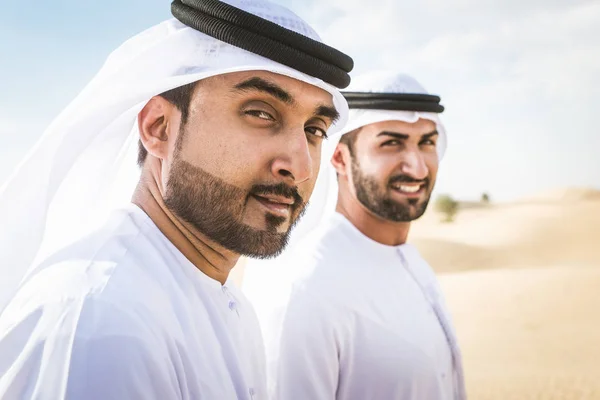 Arabic men in the desert — Stok fotoğraf