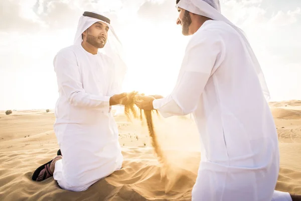 Arabic men in the desert — Stok fotoğraf