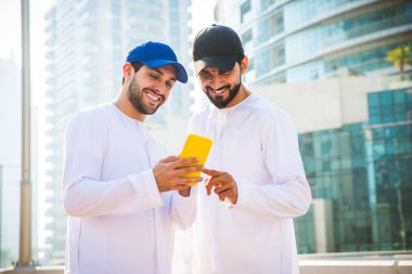 Two men with kandora in Dubai