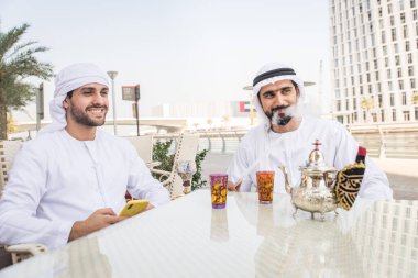 Two men with kandora in Dubai