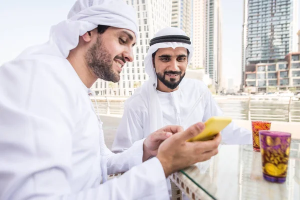 Two men with kandora in Dubai