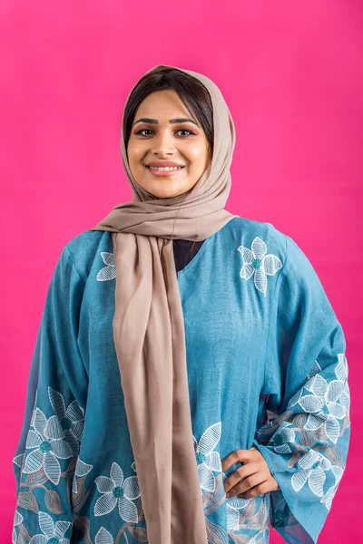 Arabic woman with abaya in studio