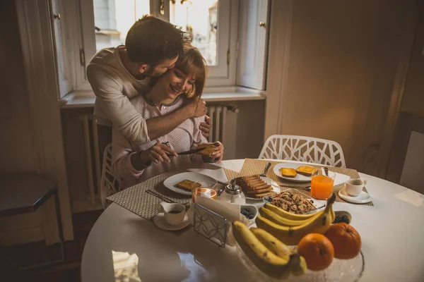 Happy couple making breakfast at home. Concept about lifestyle, — Stock Photo, Image