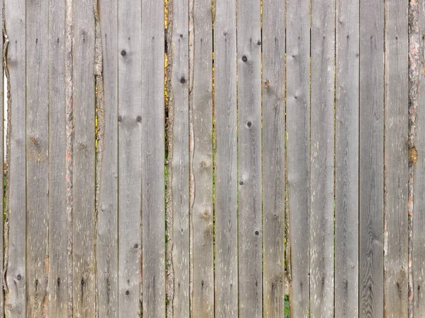 Pared de madera de una antigua valla en el pueblo —  Fotos de Stock