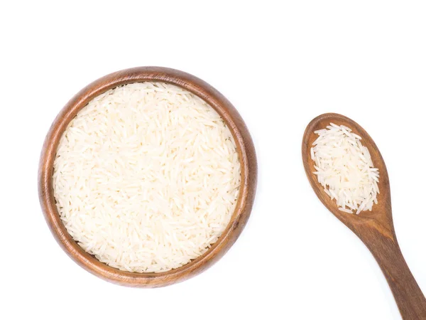 Индийское длинное зерно Басмати рис в коричневой деревянной миске и ложка является — стоковое фото