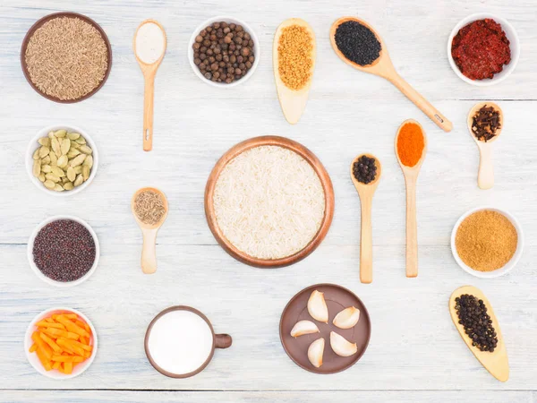 Ingredients for cooking white rice: salt, allspice, cumin (jeera