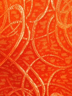 Mağazada asılı duran kırmızı renkli kumaş. Moda kıyafetleri ve iç mekan kavramı.