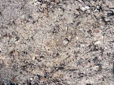 Küllerden ve taşlardan oluşan bir arka plan. Soyut arkaplan kavramı