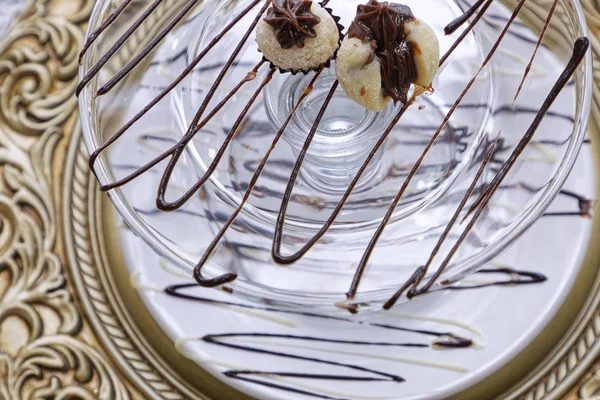 White Coconut Candies Liquid Chocolate Glass Plate — Stock Photo, Image