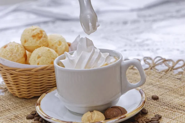 Cup Hot Cappuccino Whipped Cream Biscuits White Plate Basket Buns — 스톡 사진