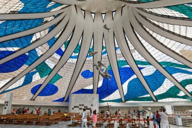 people coming to Metropolitan Cathedral of Nossa Senhora Aparecida in Brasilia, Brazil clipart