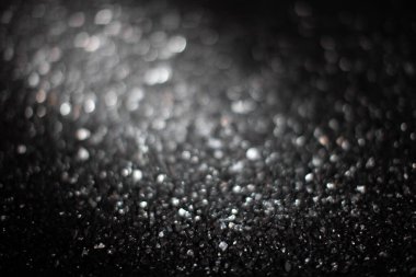 Bokeh odaklı ışıklarla siyah beyaz soyut arkaplan