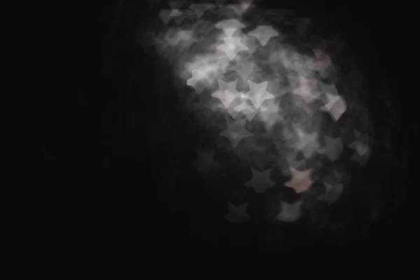 Монохромный абстрактный фон с боке разряженные огни — стоковое фото