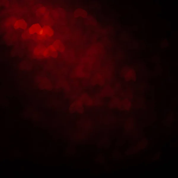 Vermelho fundo abstrato com bokeh luzes desfocadas — Fotografia de Stock