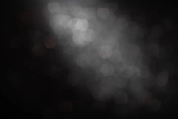 Monochrom abstrakter Hintergrund mit Bokeh defokussierten Lichtern — Stockfoto
