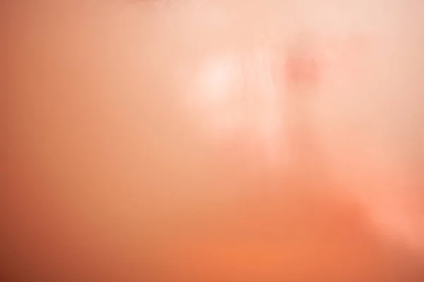 パステルカラーの赤とオレンジの抽象的なぼやけた背景 — ストック写真