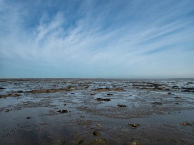 View of the Wadden Sea on the coast of Dornumersiel in Germany i clipart