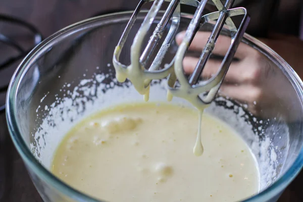 Whisking dough mixture — Stock Photo, Image