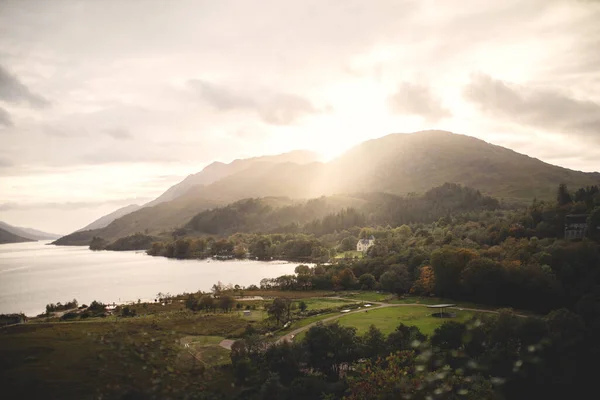 Sunset over the mountain and the Scottish countryside. — Stock Photo, Image