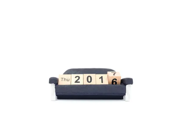 New year concept , Word 2016 on wood block and moving to the word 2017 — Stock Photo, Image