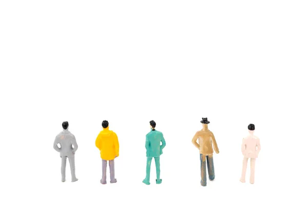 Grupo de empresários em miniatura sobre fundo branco — Fotografia de Stock