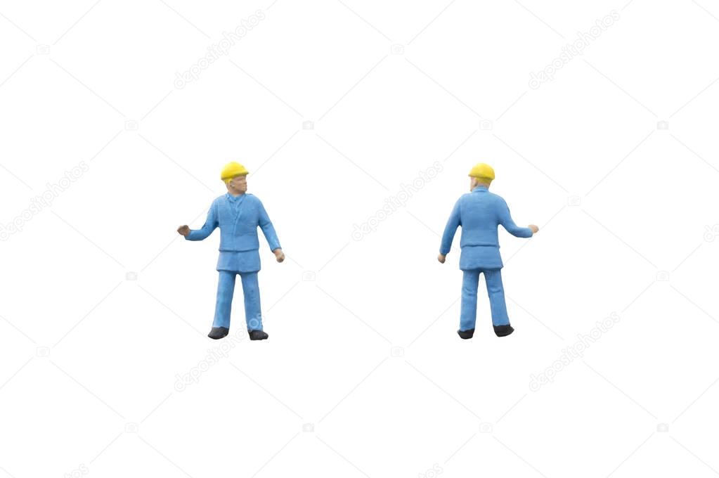 Miniature people worker construction concept on white background