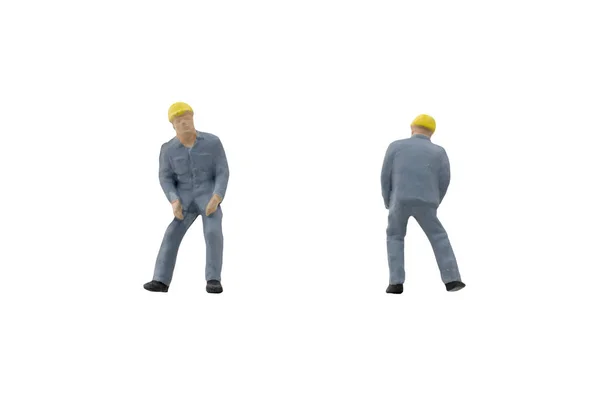 Pessoas em miniatura conceito de construção do trabalhador no fundo branco — Fotografia de Stock