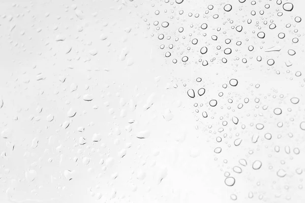 Kapky vody na skle, černé a bílé — Stock fotografie