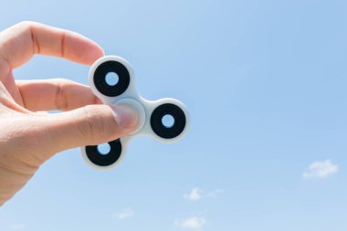 Topluca spinner holding eller 