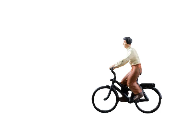 孤立在白色背景上的微型图骑自行车 — 图库照片