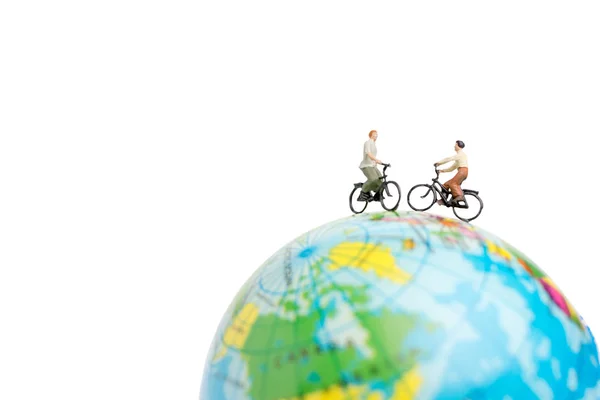 与地球上的自行车微型人旅行 — 图库照片