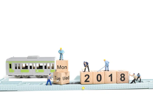 Worker team build wooden block number 2018