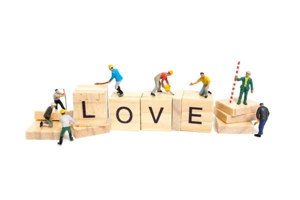 Personas en miniatura: Palabra de equipo de trabajo "Amor  " —  Fotos de Stock