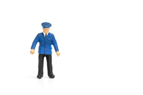 Pessoas em miniatura: Policial sobre fundo branco — Fotografia de Stock