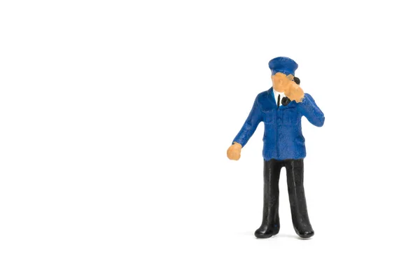 Personnes miniatures : policier sur fond blanc — Photo