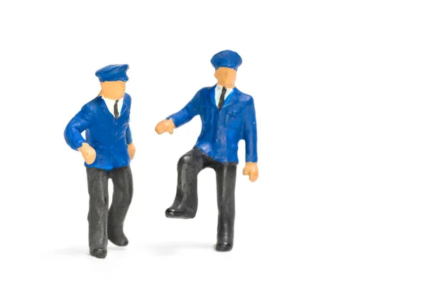 Pessoas em miniatura: Policial sobre fundo branco — Fotografia de Stock