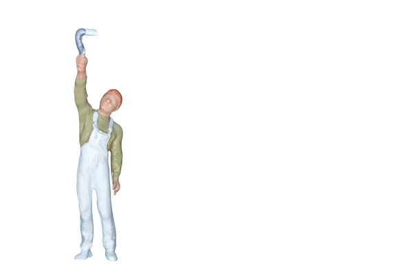 Personas en miniatura: Pintor sosteniendo un pincel aislado en bac blanco — Foto de Stock