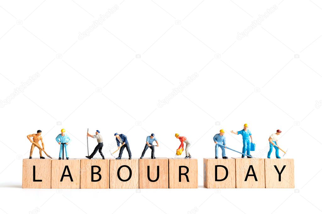 Miniature people ,worker team standing on white background and copy space for your text , Labour day concept
