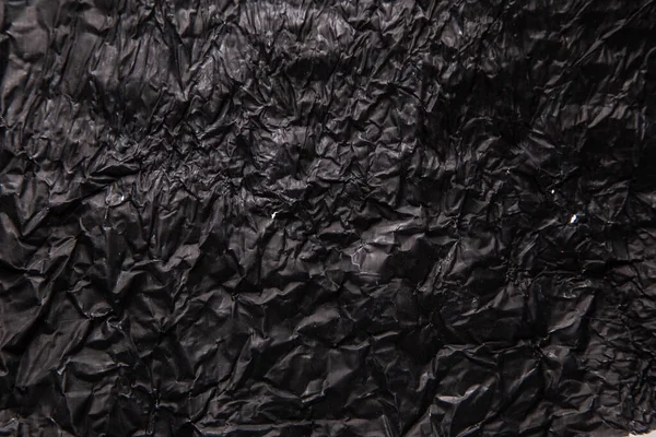 Zwarte Achtergrond Een Verfrommelde Textuur Close — Stockfoto