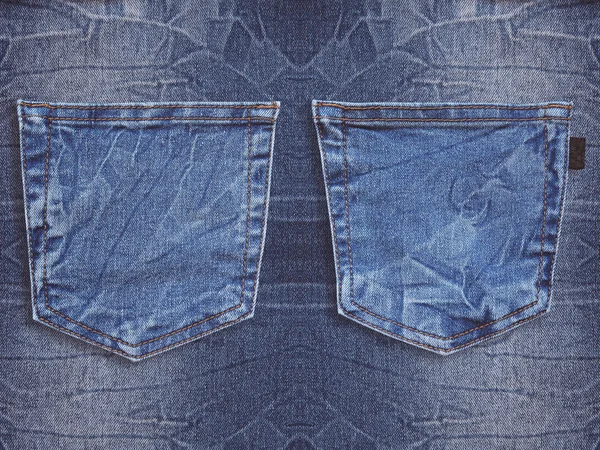 Tasca jeans su fondo traforato denim — Foto Stock