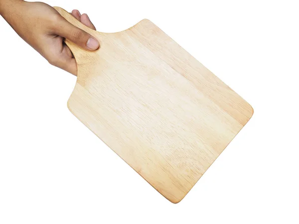 Hand holding wooden plate over white background. Top view — Stock Photo, Image