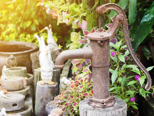 Vintage rusty hand water pump