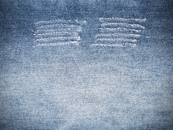 Déchiré motif de jeans en denim bleu texture et fond — Photo