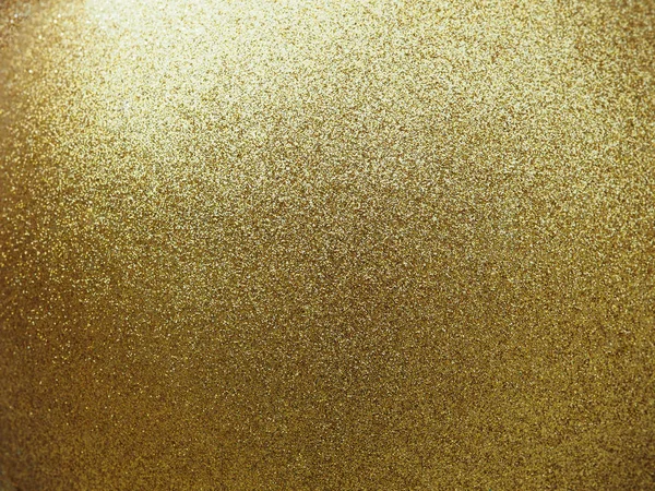 Texturierte goldene runde Kugel mit Glitzern. — Stockfoto