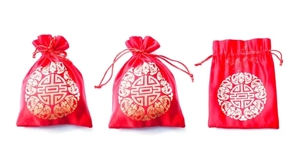 Red silky money bag with Chinese pattern isolated on white backg — Stock Photo, Image