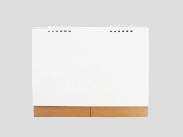 Empty white and brown desktop calendar isolated on grey backgrou — Stock Photo, Image